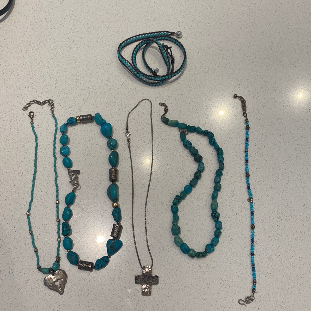 Assorted silver and turquoise jewelry.